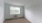 a bedroom with a window and air conditioning unit
