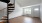 a living room with a staircase