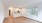 a living room with a large window next to a kitchen