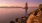 a lighthouse over a large body of water